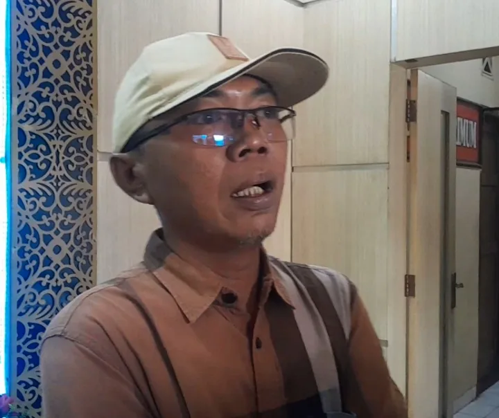 Komar Raenudin alias Udin Amuk