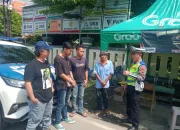 Awas Bahaya Gunakan Ponsel Sambil Nyetir, Satlantas Lakukan Sosialisasi ke Paguyuban Ojol